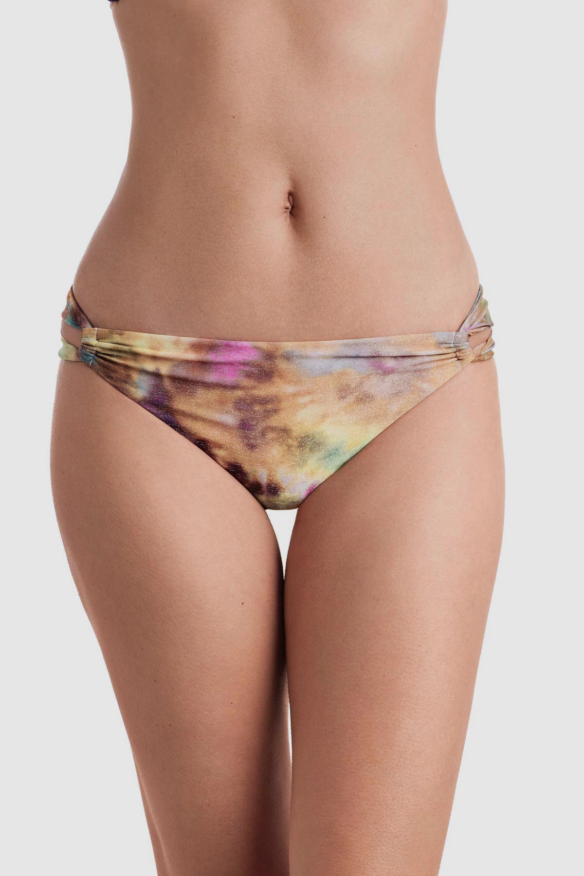 Front view of tie dye swim bottoms with side cutouts
