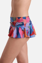 Side view of multicolored abstract skirted swim bottoms
