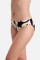 Side of large black and tan palm leaf printed swim bottoms