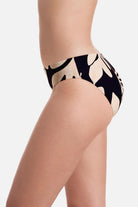 Side of large black and tan palm leaf printed swim bottoms
