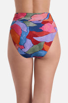 Back view of high waisted multicolored abstract printed swim bottoms