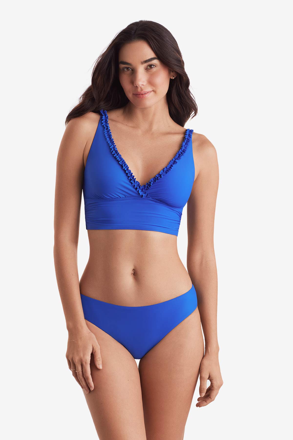 Woman wearing a midkini swim top with matching swim bottoms