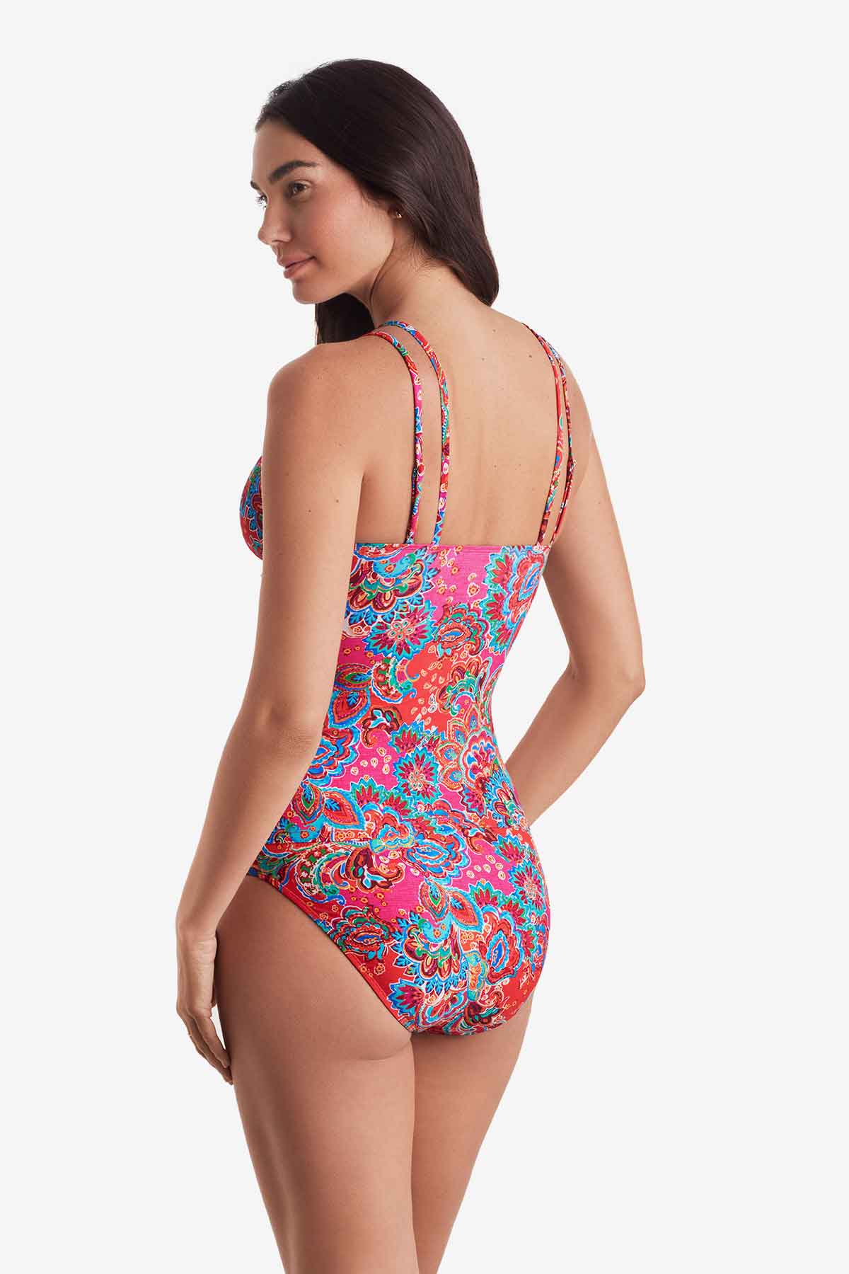 Woman turned left wearing a multicolor paisley print tankini top with matching swim bottoms