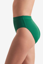 Side of high-waisted green rib fabric swim bottoms