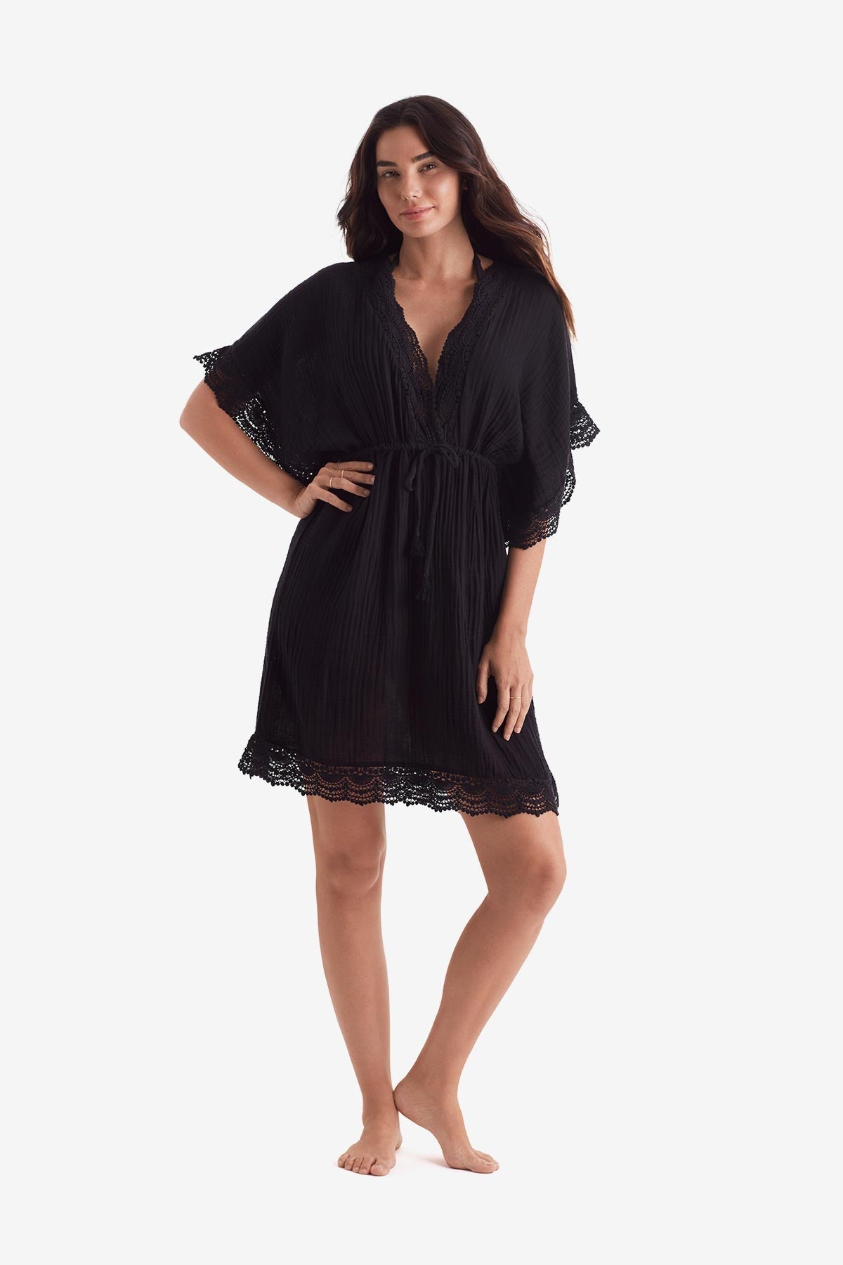 Woman wearing a black tunic dress