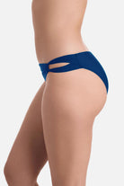 Side view of dark blue side cutout swim bottoms