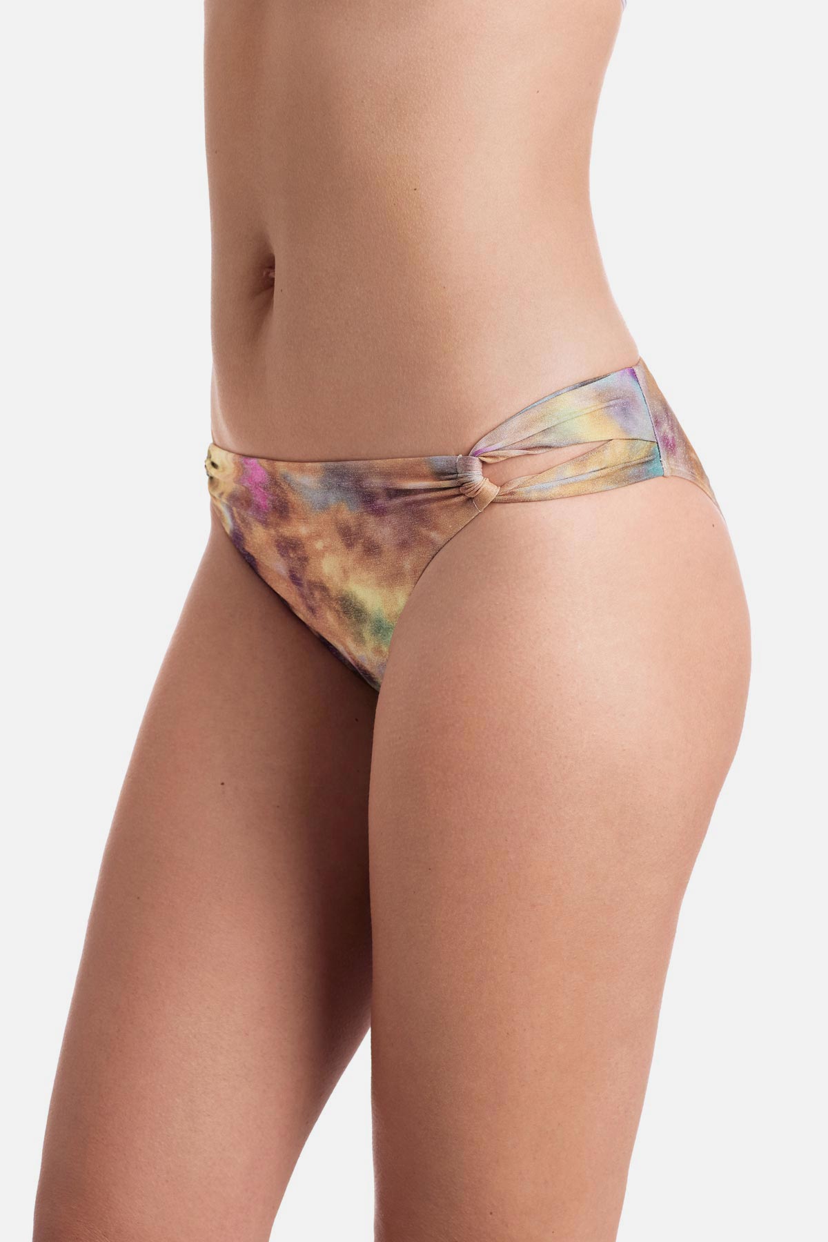 Side view of tie dye swim bottoms with side cutouts 