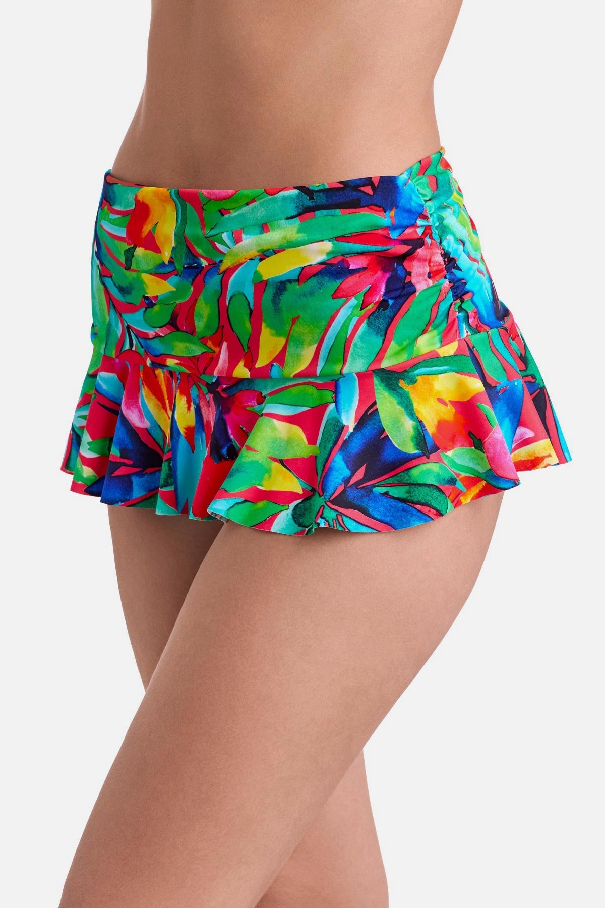 Side view of multicolored palm leaf printed skirted swim bottoms